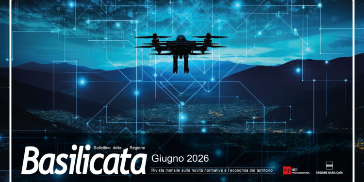 Immagine di copertina del Bollettino Basilicata ilSole24Ore di giugno 2026 con un drone che sorvola una citta nell'oscurità della notte